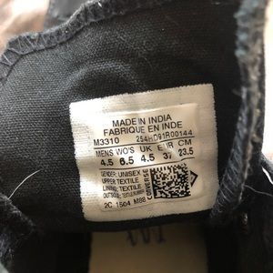 All black high top converse